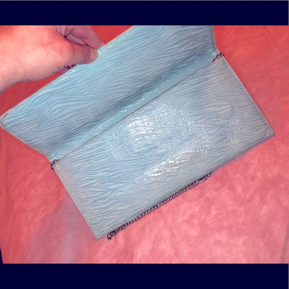 EUC Carlos Falchi zebra print clutch